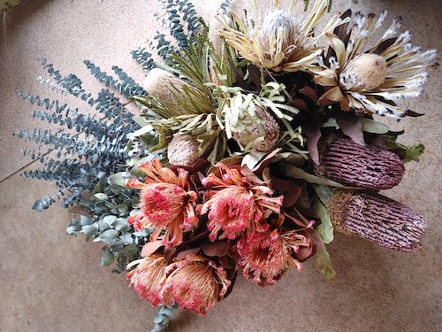 A mix of dried and preserved Australian native flowers and foliage