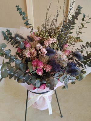 Bouquet of drieds in pink and blue tones